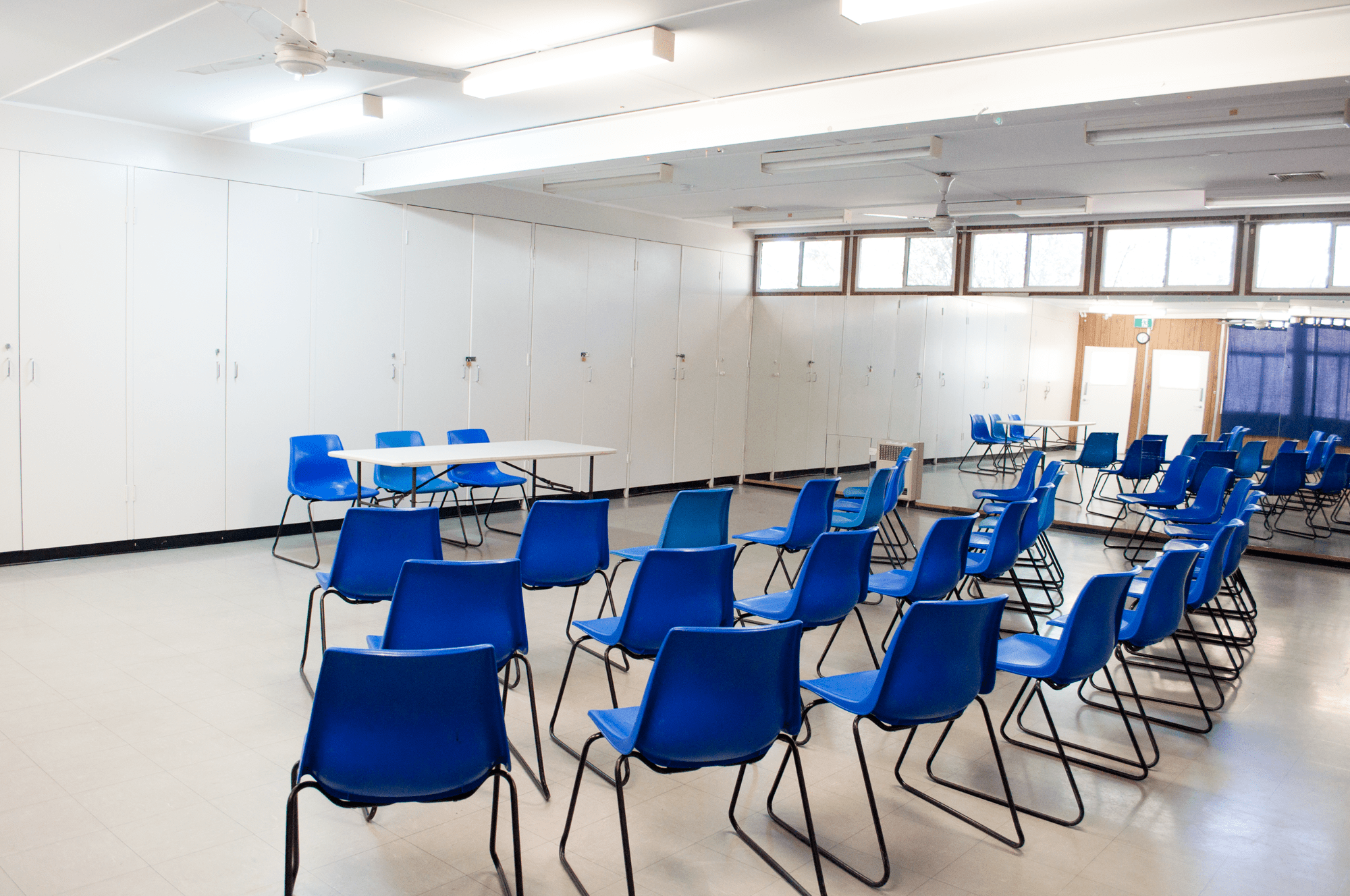 Chairs set up for presentation at Nellie Hall